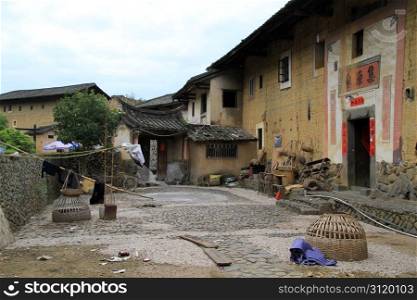 inner yard near tulou in chinese village; China