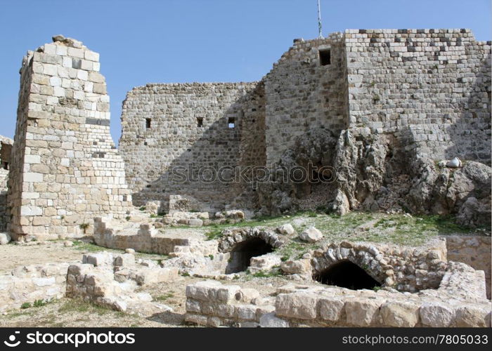 Inner yard of big stone castle Masyaf in Syria