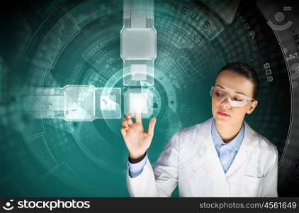 Innovation technologies. Image of young woman scientist touching icon of media screen