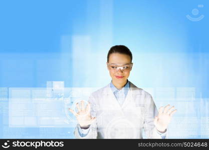 Innovation technologies. Image of young woman scientist touching icon of media screen