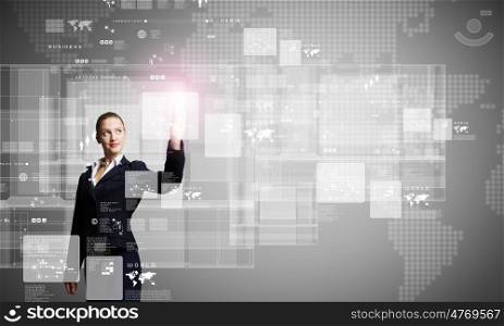 Innovative technologies. Attractive businesswoman touching icon of media screen