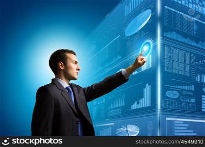 Innovative technologies. Image of businessman pushing icon of media screen. Marketing concept