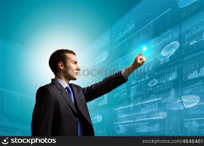 Innovative technologies. Image of businessman pushing icon of media screen. Marketing concept