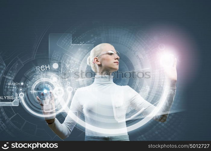 Innovative technologies. Woman in white touching icon of media screen