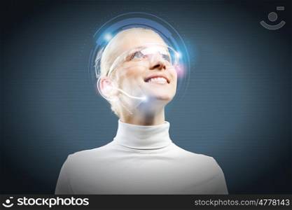Innovative technologies. Young woman in white with hologram round head