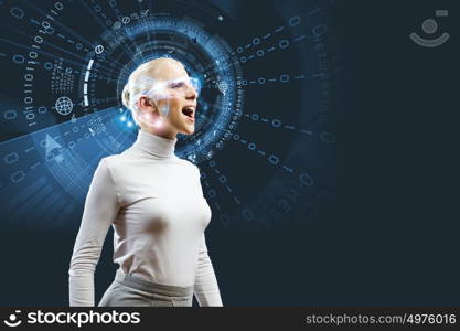 Innovative technologies. Young woman in white with hologram round head