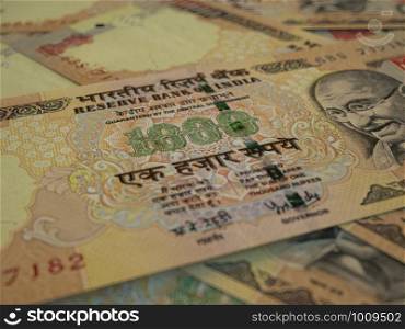 INR. Indian currency. Money of India business background. Indian Rupees closeup photo, blurred back.. Indian Rupees. Money of India business background. INR
