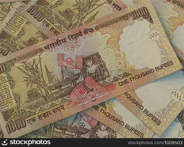 INR. Indian currency. Money of India business background. Indian Rupees closeup photo, blurred back.. Indian Rupees. Money of India business background. INR