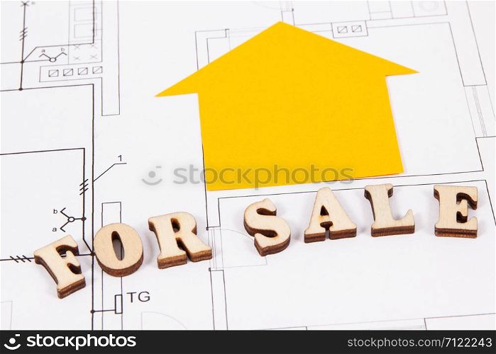 Inscription for sale on electrical construction diagrams of housing plan, concept of selling house. Inscription for sale on electrical construction housing plan, concept of selling house