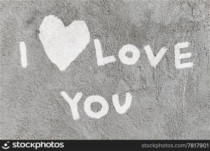 inscription I love you with abstract heart on the concrete wall
