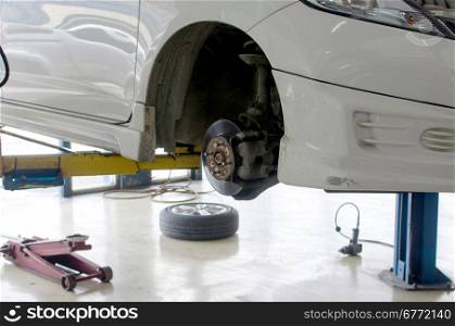 Inside a garage - changing wheels/tires