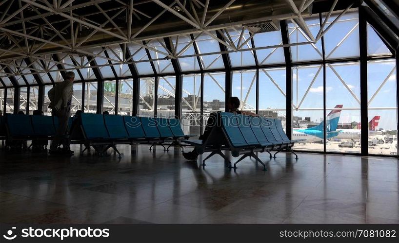 Inside an airport terminal during a sunny day