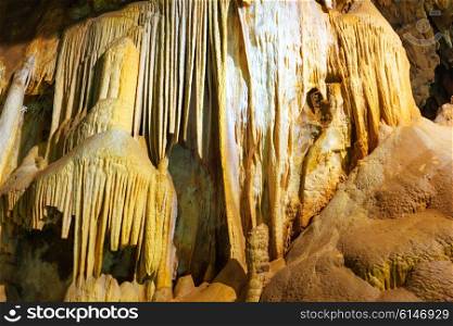 Inside of beautiful old dark cave with many stalactites. Grotte di Is Zuddas, Italy, Sardinia