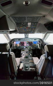 Inside view Cockpit G550. Inside view Cockpit G550 with blue sky and clouds