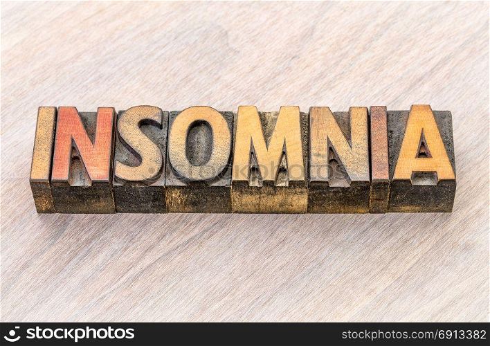 insomnia (sleep disorder) - word abstract in vintage letterpress wood type printing blocks