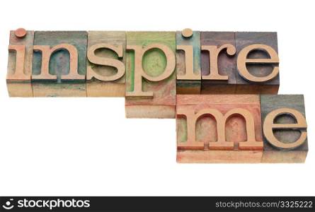 inspiration concept - inspire me isolated phrase in vintage wood letterpress printing blocks