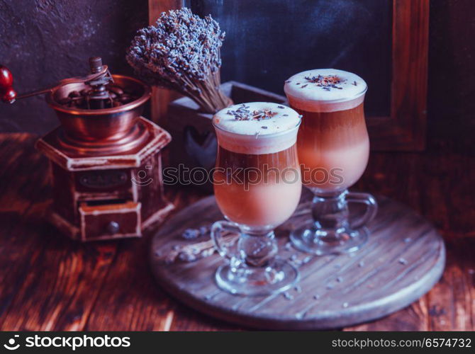 Inspiration from a good latte. The magic lavender latte macchiato with chocolate syrup and vintage decorating elements