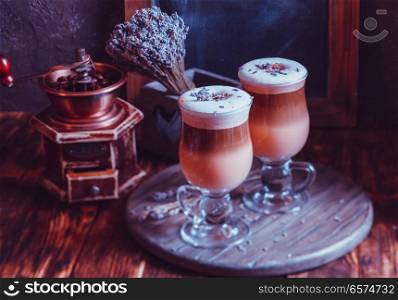 Inspiration from a good latte. The magic lavender latte macchiato with chocolate syrup and vintage decorating elements