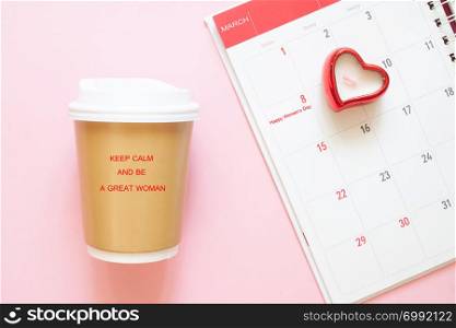 Inspiration quote keep calm and be a great woman on coffee cup with calendar March, 8th. Woman&rsquo;s Day concept