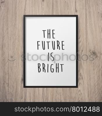 Inspirational motivating quote poster on frame with wooden wall background