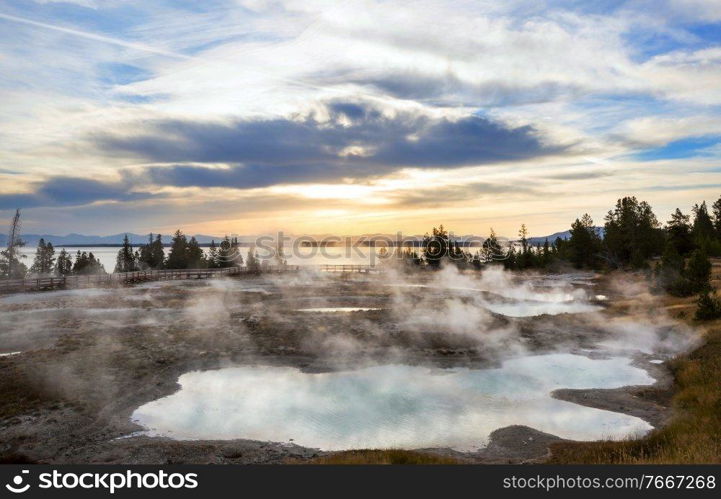 Inspiring natural background. Pools and  geysers  fields  in Yellowstone National Park, USA.