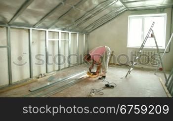 Installation of gypsum plasterboard ceilings - cutting drywall stud