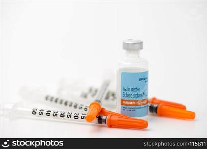 Insulin ampoule with syringe lie