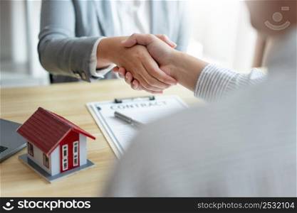 Insurance concept the chattel agent making a perfect deal of estate with his customer.