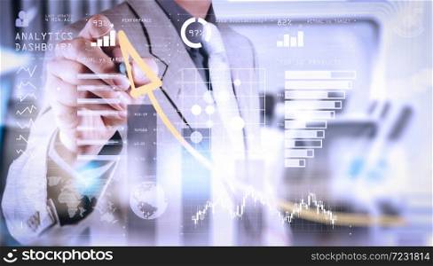 Intelligence (BI) and business analytics (BA) with key performance indicators (KPI) dashboard concept.double exposure of businessman hand draws business success chart concept on virtual screen.