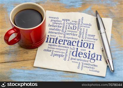 interaction design word cloud - handwriting on a napkin with a cup of coffee