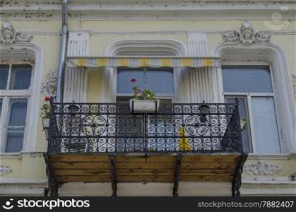Interesting balcony at old building in Ruse - beauty town with varied style West-European architecture, Bulgaria, Europe