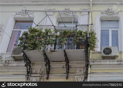 Interesting balcony at old building in Ruse - beauty town with varied style West-European architecture, Bulgaria, Europe