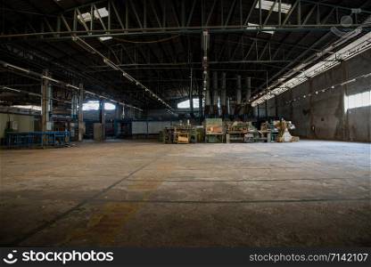 interior abandoned factory experiencing economic problems is about to close.Furniture factory that has economic problems