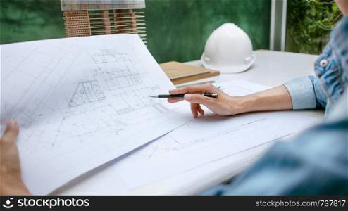 interior architecture working on building plan project.