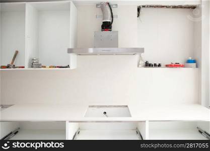 Interior design construction of a kitchen with cooker extractor fan hood