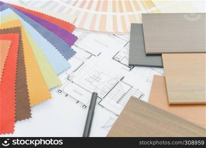 Interior designer's working table with sample of material
