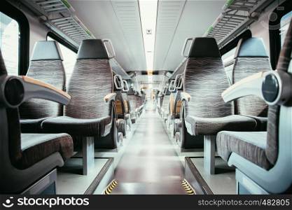 Interior of a public transport train, blurry background