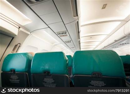 Interior of airplane with row of seats