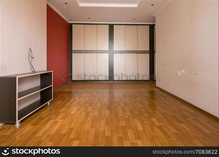 Interior of an empty room, built-in wardrobe compartment