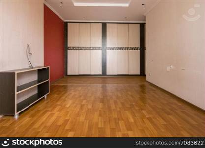 Interior of an empty room, built-in wardrobe compartment