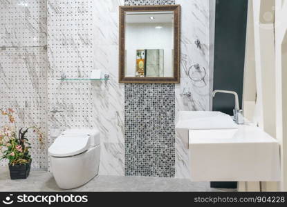 Interior of bathroom with sink basin faucet and mirror. Modern design of bathroom