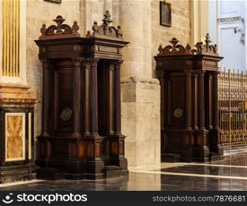 Interior of catholic church: confessional detail, 150 years old, made of wood