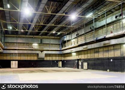 Interior of empty warehouse available as posing theater too