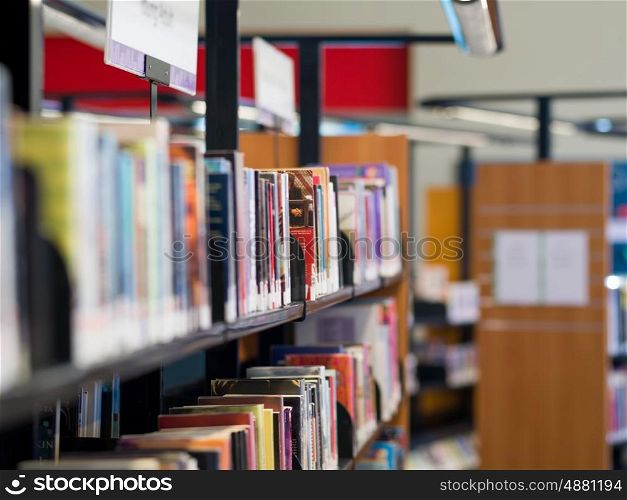 Interior of library with book shelves. Interior of library with book shelves with books