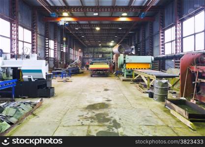 interior of mechanical workshop with metal lathes and machines