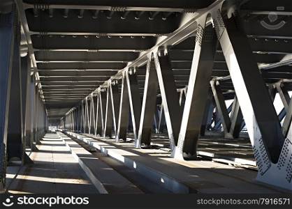 Interior of metal bridge in the day. Kiev, Ukraine