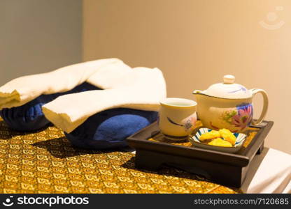 Interior of modern massage and spa room in warm light