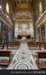 Interior of the Basilica of St Mary in Trastevere. ROME, ITALY - MARCH 19, 2018: Interior of the Church of Santa Maria in Trastevere, Rome, Italy. Interior of the Basilica of St Mary in Trastevere