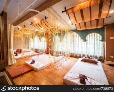 Interior of vintage massage room with nature light source from window, Thailand