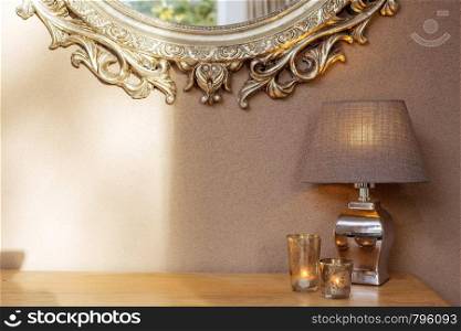 Interior with mirror and decoration lamp and candles with brown wall modern design. Interior with mirror and decoration lamp and candles with brown wall